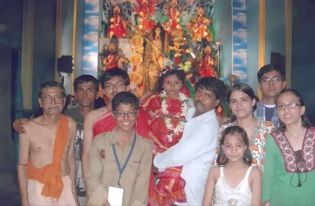 Members and children at the pandal