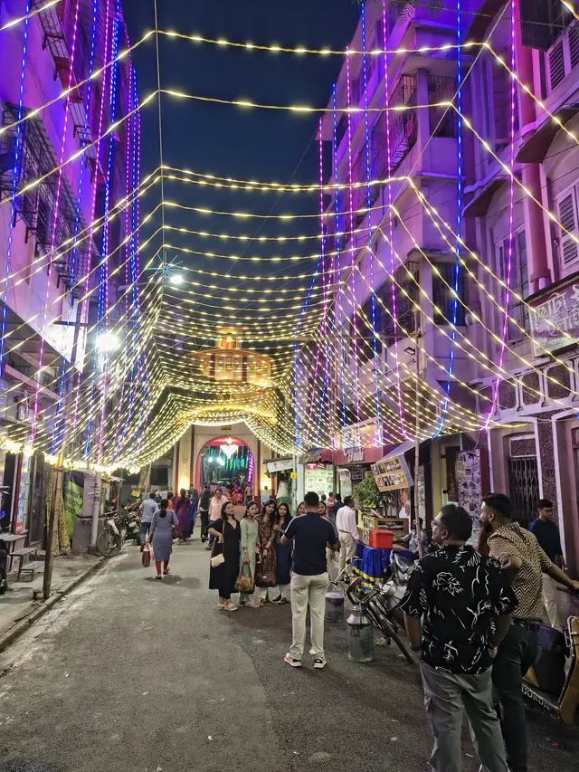 Lights over the lane leading to the pandal on Shashthi evening