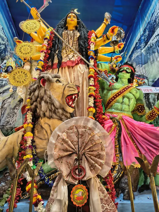 The kola bou at the feet of the goddess on Maha Saptami