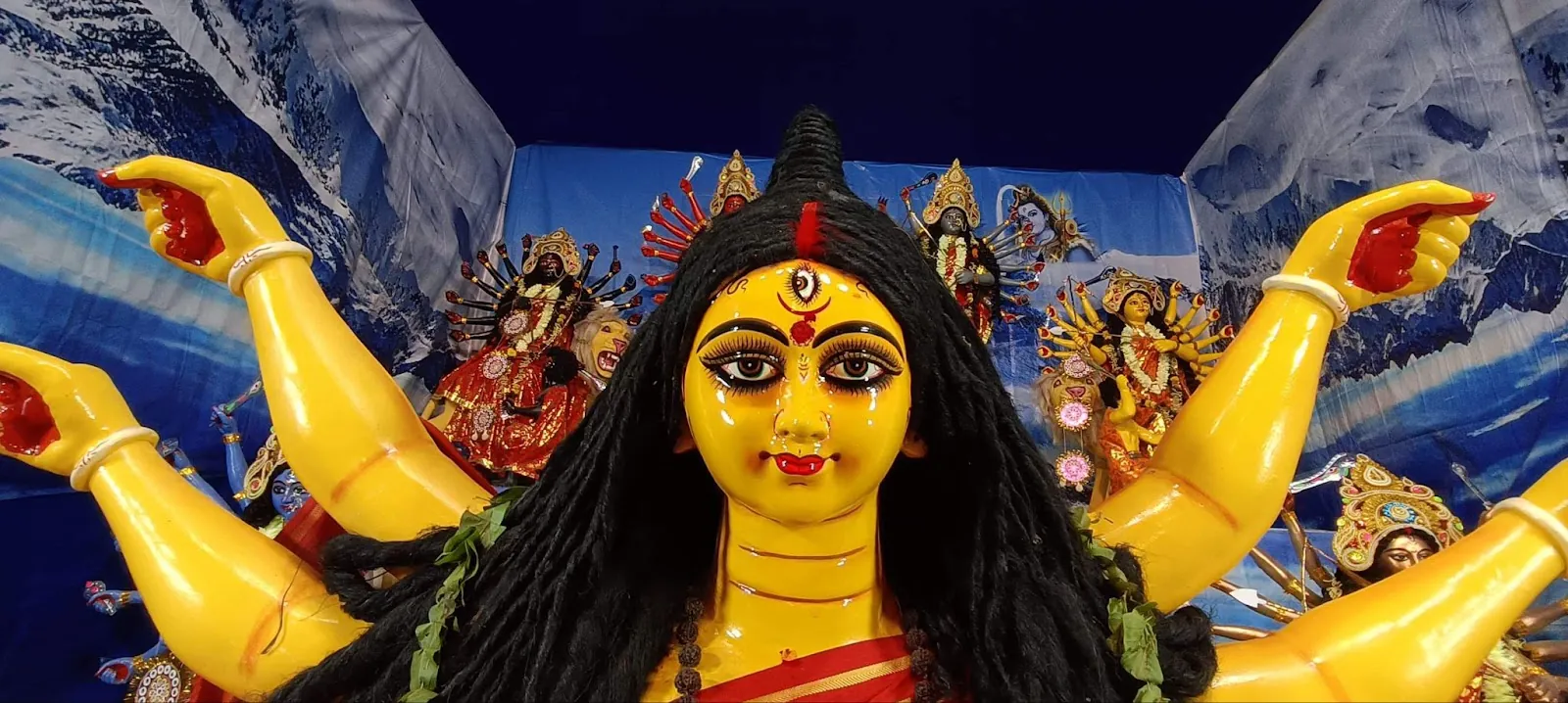 Ma Durga, the central Dashabhuja idol of Jeliatola Naba Durga Puja, with the other goddesses behind her