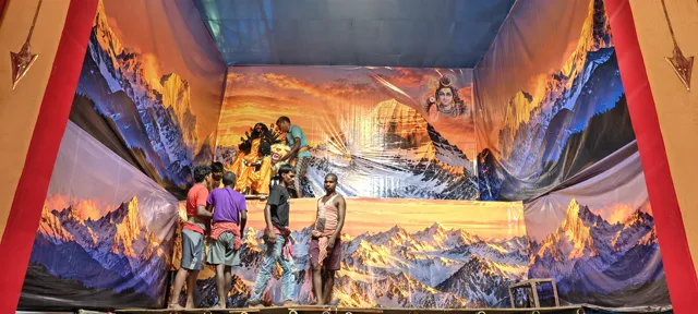The first goddess is set on the stage before the mountain backdrop