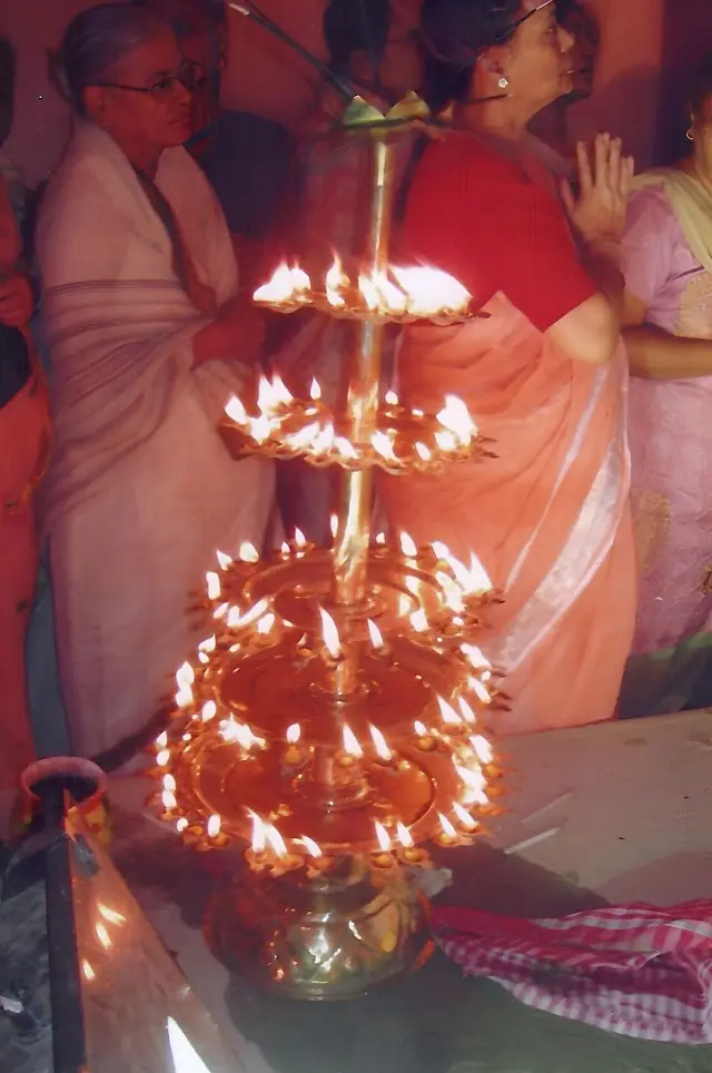 The many-tiered aarti lamp